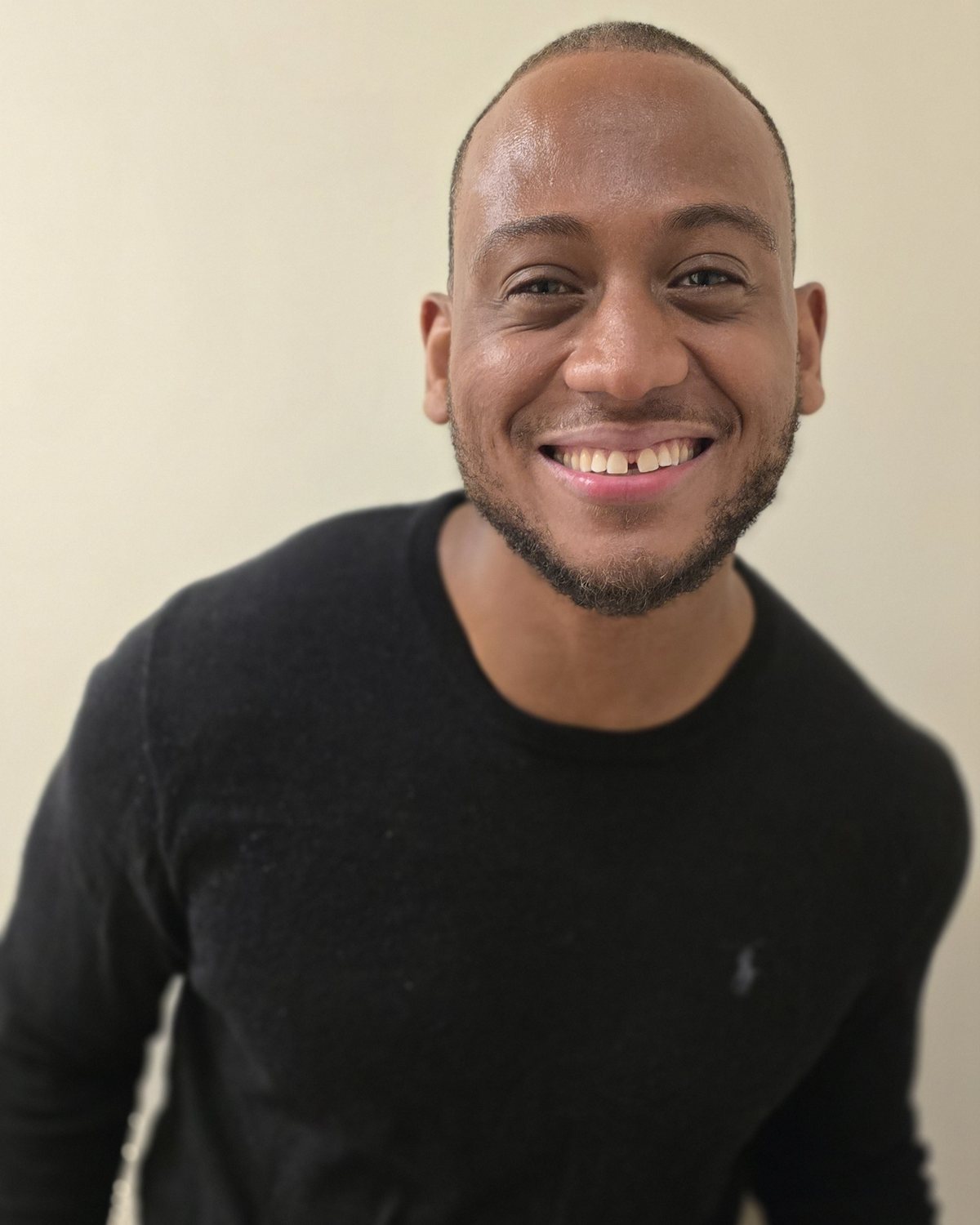 Kadeem Yearwood, Founder & Principal of AEQUARA — warm portrait, New York, May 2026